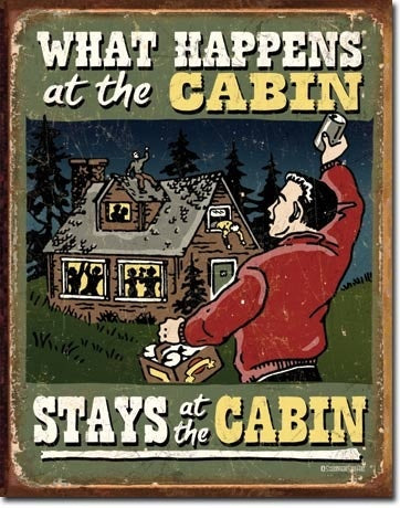 Cabin What Happens Tin Sign