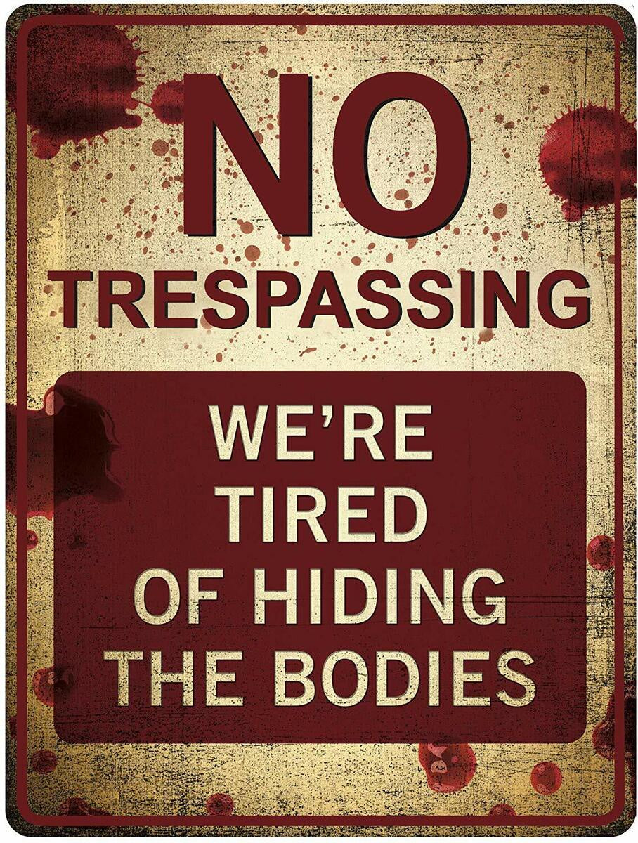 No Trespassing We're Tired of Hiding the Bodies Tin Sign